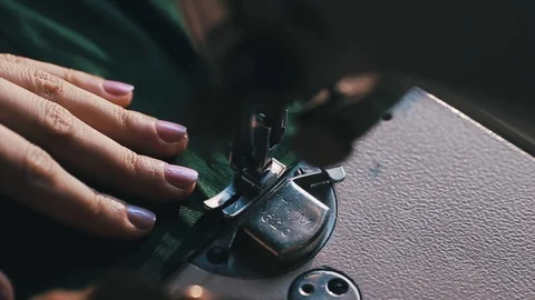 Tailor at Work on Sewing Machine Stock Footage 86450312