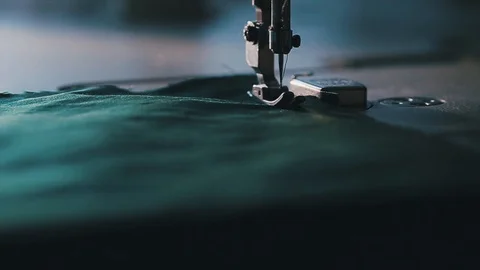 Tailor at Work on Sewing Machine Video stock 86450335