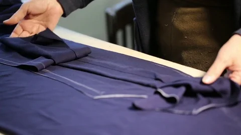 The tailor work. Sewing process.  Stock-Footage 75447991