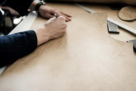 The tailor is working with a drawing Stock Photos