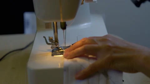 Tailor working on sewing machine Stock Footage 131414542
