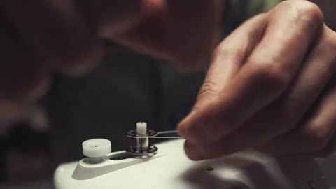 Tailor working with a sewing machine Stock Footage 136544127