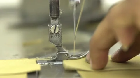 Tailor working on swing machine 库存影片 152329160