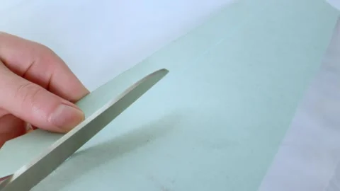 Tailor.Hands notch tailor tailor's scissors cloth. Video stock 269799180