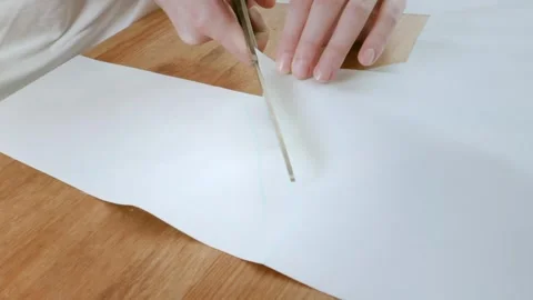 Tailor.Hands notch tailor tailor's scissors cloth. Video stock 269802349