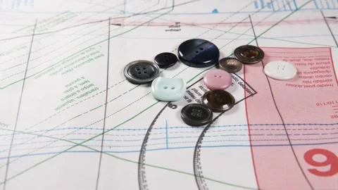 Tailoring accessories, buttons, patterns, on work table Видео 148182475
