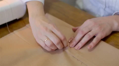Tailoring .Hands notch tailor tailor's scissors cloth. Stock Footage 59938887