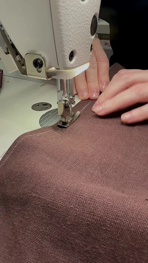 Tailoring Process: From Marking to Machine Sewing. Close-up of tailor sewing Video stock 310461587