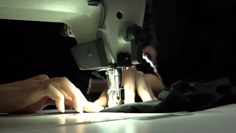 Tailoring on the sewing machine Video stock 104537752