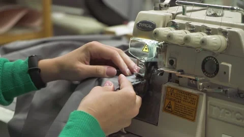 Tailoring on the sewing machine. Sewing process close up 스톡 동영상 164148632