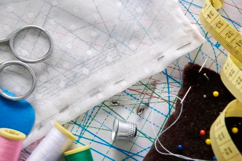 Tailoring tools on clothing pattern top view 写真素材