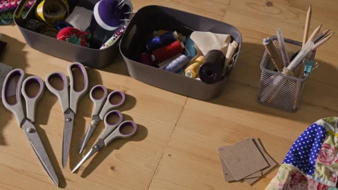 Tailoring Tools with Sewing Accessories Lying on Wooden Desk Stock Footage 341940319