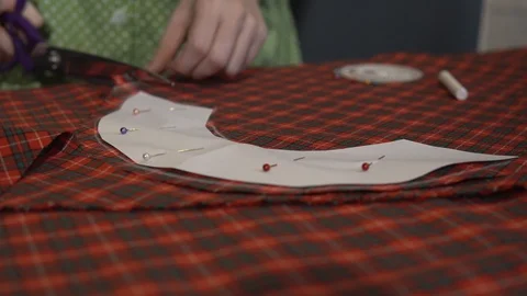 Tailors hands cutting a fabric Stock Footage 88757153