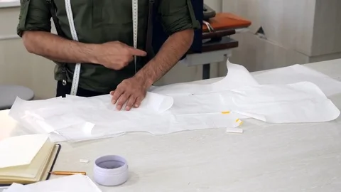 The tailors hands measures template with a white meter Stock Footage 80737484