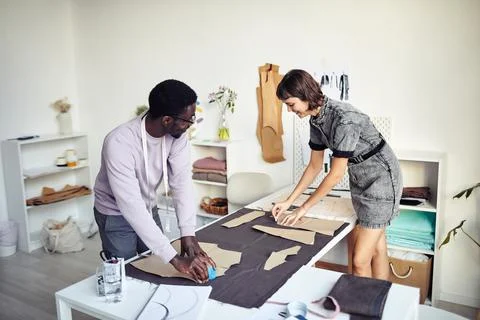 Tailors Outlining Sewing Patterns Stock Photos