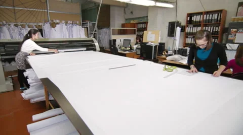 Tailors preparing patterns to sew Stock Footage 62351859