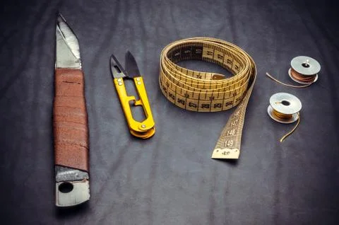 Tailor's tools on a black background Foto stock