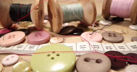 Tailor's workshop with threads on spools and tape measure. Stock Footage 168249603