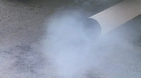 Tailpipe combustion emissions create smog, belching exhaust and fumes Stock Footage