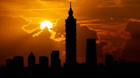 Taipei: Metropolis Skyline at Sunset, Time Lapse with Red Sun and Fiery Sky Stock Footage 165648065