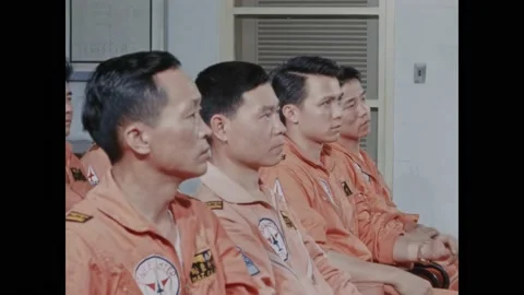 TAIWAN - 1969 - A USAF lieutenant colonel lectures Chinese airmen on F-104 Stock Footage 316296487