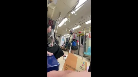 Taiwan: Passenger refuses to give up priority seat to a pensioner then ki... Stock Footage 320918486