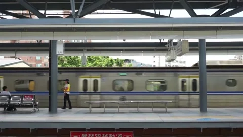 Taiwan train arriving at the platform Stock Footage 151091904