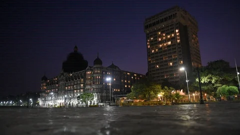 The Taj Hotel stands beyond an empty street Stock Footage 129608944