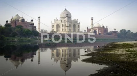 Taj Mahal Above Jamuna River Stock Photos
