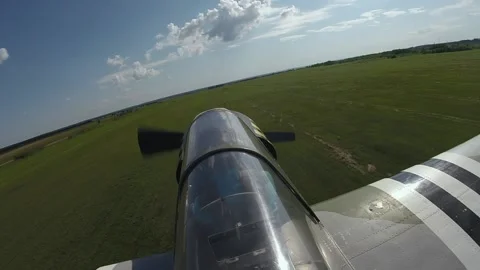 Take-off of the aircraft flight of the yak 52 aircraft from inside the cabin Stock Footage 202120344