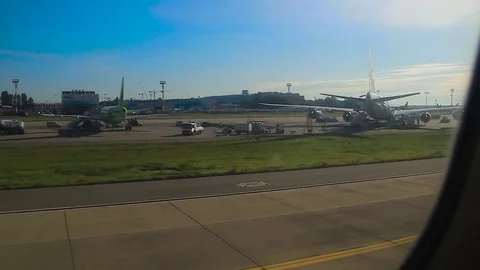 Take-off of the aircraft from the inside Stock Footage 80477048