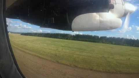 Take-off of an airplane, shooting from a side window Stock Footage 172089235