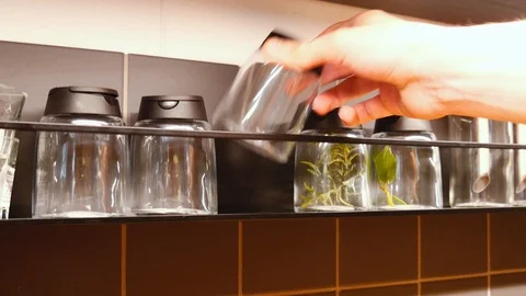 Take and put kitchen glass spice organizer Stock Footage 111643162