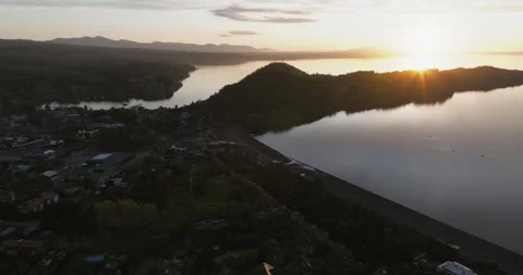 Take area orbits the city of Pucon and its two bays in a sun transmitting a.. Stock Footage 290011495