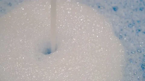 To take a bath. White foam in the bathroom. Home comfort. Stock Footage 232019414