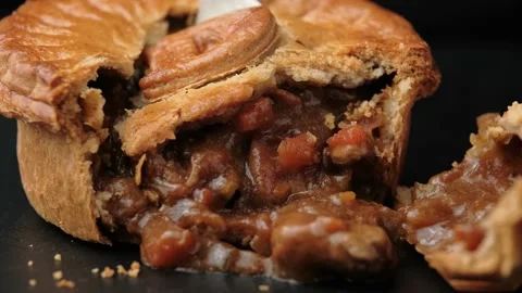 Take a bite of tasty British beef steak pie with wine gravy. Stock Footage 148644291