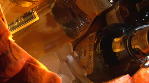 Take bottle beer from inside the Halloween pumpkin jack o'lantern Stock Footage