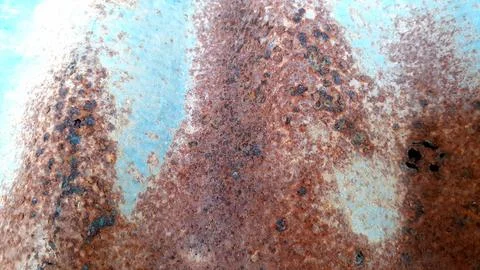 Take close-up shot with the rusty iron blue background. Abstract metal. Stock-Fotos