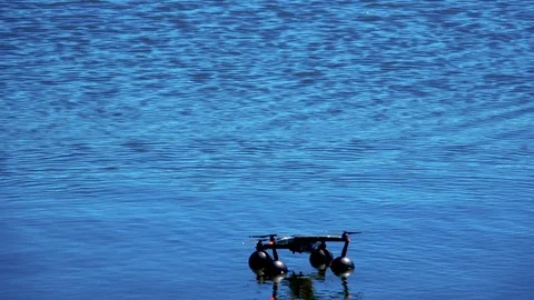 Take-off of the drone from the water Stock Footage 76161350