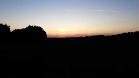 Take off in a field over a hill during sunset and dawn Stock Footage 159097486