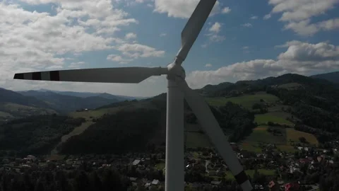 Take off in front of wind turbine Stock Footage 140070003