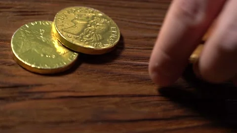 Take the Gold Coins from the Table. Concept: Take the Money Stock Footage 156809823