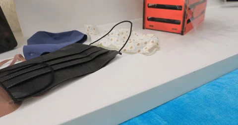 Take the mask off the table Video stock 145570469