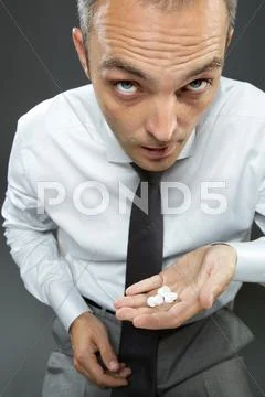 Take medication Stock Photos