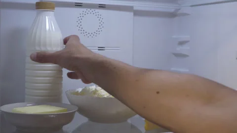 Take milk from the refrigerator Video stock 252644435