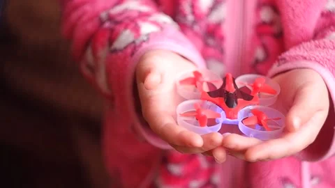  take off a mini drone from the hand.  Stock Footage 151606178