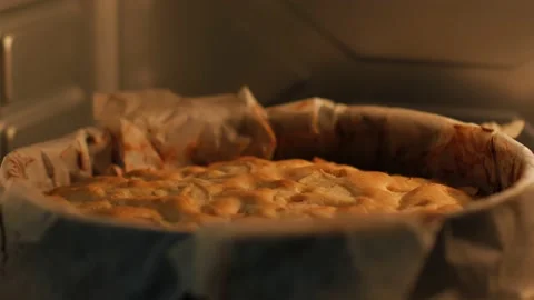 Take Out Pie From Oven Stock Footage 144857771