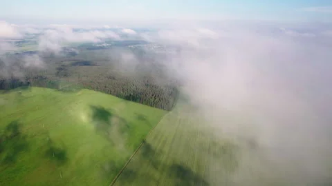 Take off over lush clouds in the countryside Video stock 157598791