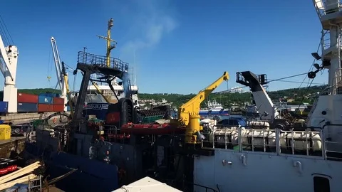 Take-off of the quadcopter from the port. Views on cargo vessels with containers Stock Footage 84746146