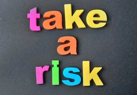 Take a risk words Stock Photos